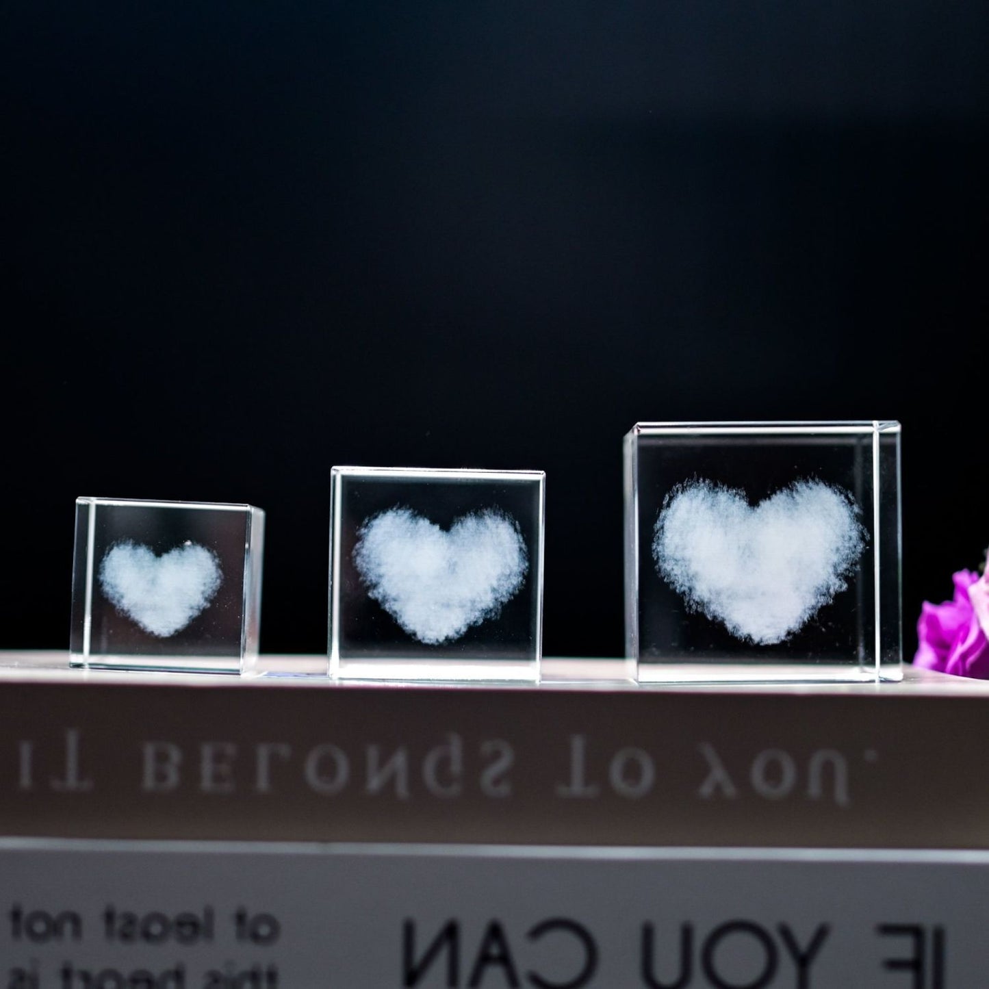 Transparent glass crystal ball with rain cloud design, a perfect feng shui home decor piece for harmony and prosperity.